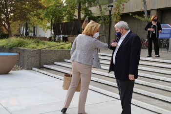 Keeping with COVID-19 protocols, NNSA Administrator Lisa E. Gordon-Hagerty elbow-bumps Lawrence Livermore National Laboratory Director Dr. Bill Goldstein during her visit to the Lab.
