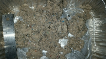 An example of a feedstock blend that combines biomass and MSW to improve feedstock quality.
