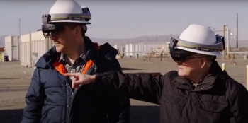 Doug Fenske, left, and Byron Gessel, team members with EM Richland Operations Office contractor Mission Support Alliance, demonstrate the use of location intelligence and mixed reality to locate underground utilities.
