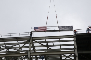 The UPF Project places the last piece of structural steel on the Salvage and Accountability Building (SAB) during an Oct. 26 âtopping outâ ceremony.