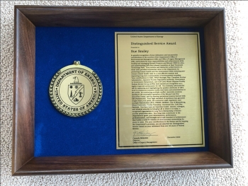 Sue Smileyâs Distinguished Service Award from DOE.