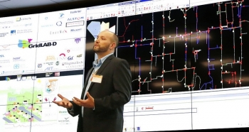 PNNL researcher Jason Fuller described PNNL power grid research at the new Systems Engineering Building. Courtesy of Pacific Northwest National Laboratory.