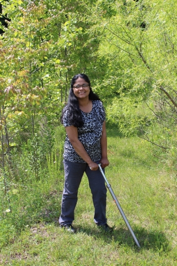 Picture of Sindhu Jagadamma at work in the field.