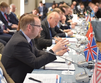 Addressing the Plenary, Dr. David Chambers of the U.K.âs Foreign & Commonwealth Office and Co-chair of Working Group 1 on âMonit