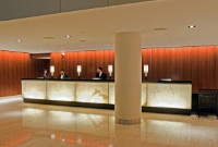 Photo of a row of PAR38 lamps attached to a truss system.