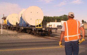 Locomotive pushing two rail casks at the Idaho National Laboratory