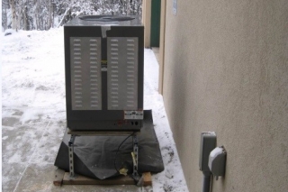 Researchers from Oak Ridge National Laboratory worked with industry partner Emerson Climate Technologies to develop a prototype for an air-source heat pump for colder areas of the country – one that uses significantly less energy while maximizing comfort. Photo | Oak Ridge National Laboratory air-source heat pump