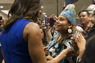 Photo of First Lady Michelle Obama with tribal youth.