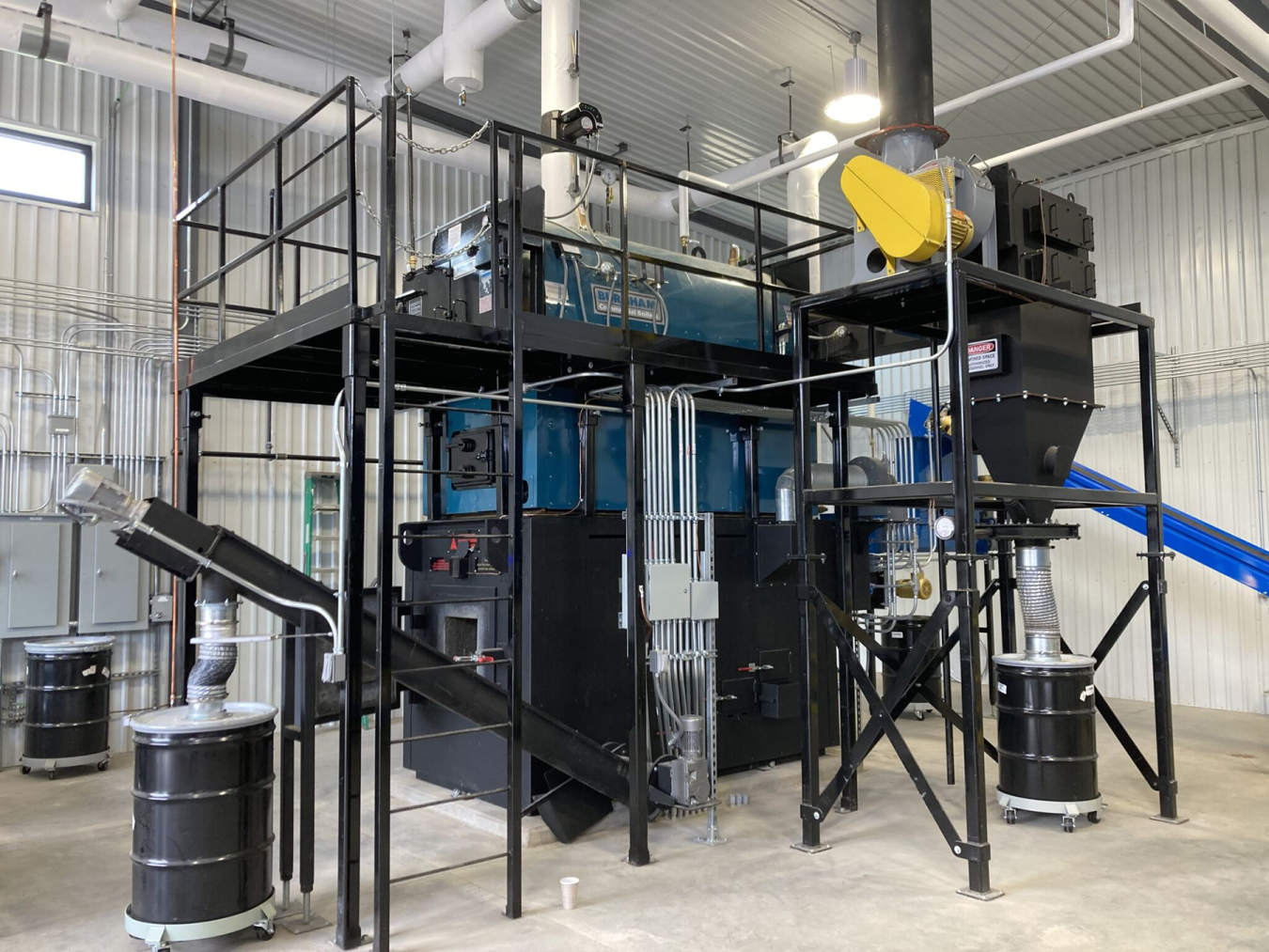 Brookston Community Center’s woodchip-fueled hydronic boiler uses cutting-edge top-feed fuel technology to eliminate clogs and minimize maintenance downtime. Photo by Joshua Gregory, Office of Indian Energy